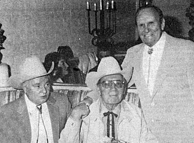 Western artist Max Harrison, Fred Scott and Gene Autry at the Autry Hotel in Palm Springs, CA.