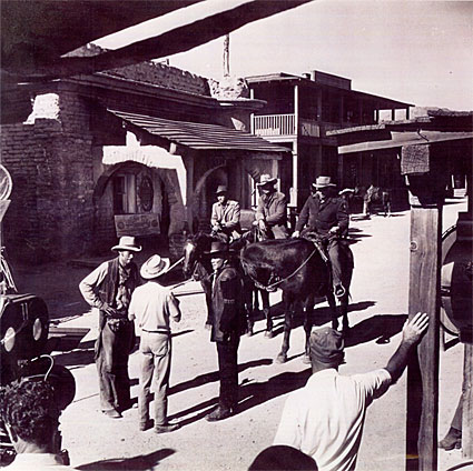 The director (in the white shirt) gives directions to Cameron Mitchell (to his right) and others at Old Tucson for a “High Chaparral” episode. 