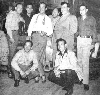 Rex Allen, The Sons of the Pioneers and Andy Devine. (L-R standing) Hugh Farr, Ken Curtis, Rex Allen, Karl Farr, Andy Devine, Lloyd Perryman. (crouched) Shug Fisher, Tommy Doss. 