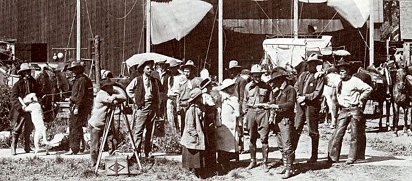 Tom Mix, script in hand, directs a scene at the Selig Zoo in L.A.’s East Lake Park in 1916. At Tom's right are George Pankey and Sid Jordan.