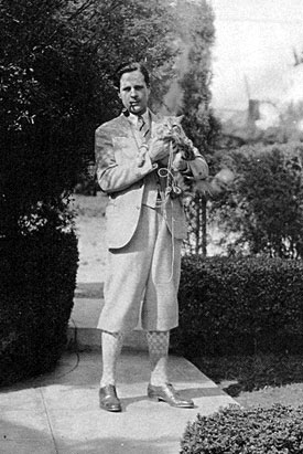 An off-the-range Ed Cobb dressed in his Plus Fours (golf pants) with pipe in mouth. Looks as if he's been walking his cat...how else to explain the leash? Obviously taken in the ‘30s. (Thanx to John Bickler.)