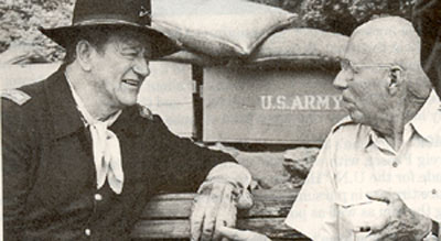 John Wayne and director Howard Hawks take a break during the filming of "Rio Lobo" (‘70).