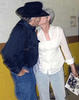 “The Virginian” James Drury gives a kiss to an admiring fan. 