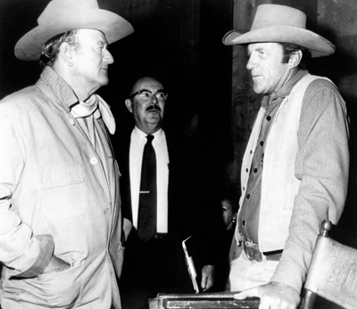 John Wayne had a lot to do with James Arness ending up on “Gunsmoke”. Wayne turned down the series and recommended Arness for the part. 