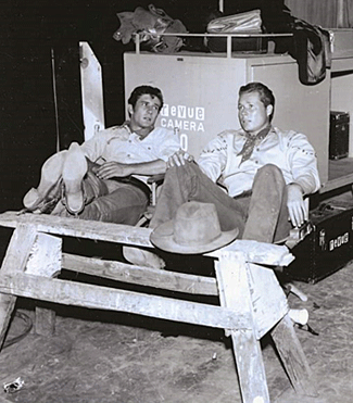 “Laramie” stars Robert Fuller and John Smith kick back and relax between scenes.
(Courtesy Terry Cutts.) 