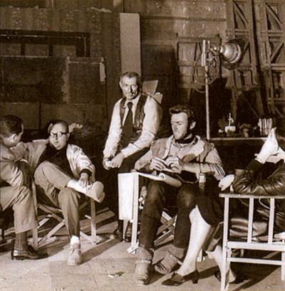(L-R) unidentified staffer, Sergio Leone, Lee Van Cleef, Clint Eastwood, unknown woman, during the filming of “For a Few Dollars More”. (Courtesy RetroFan magazine.) 