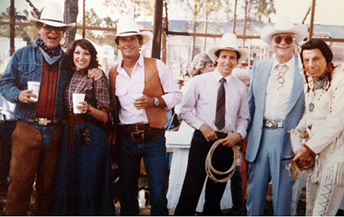 At the Cattle Baron’s Ball in Dallas, Texas...(L-R) Will and Barbara Hutchins, Peter Brown, Johnny Crawford, Monte Hale, Iron Eyes Cody. 