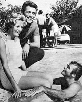 Clint Eastwood and wife Margaret poolside with friend Burt Reynolds in ‘62.