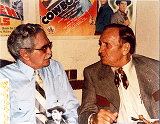 Bob Steele chats with Gene Autry at the Masquers Club honoring Bob on November 20, 1982. 