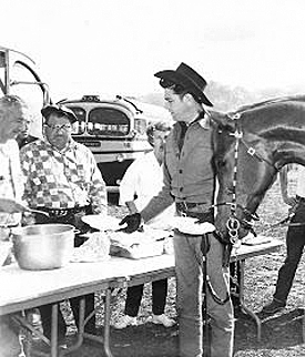 Lunchtime on the backlot for Dale Robertson while filming “Tales of Wells Fargo”. 