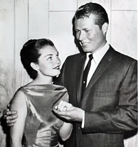 John Smith, star of “Laramie”, presents actress Luana Patten with a 2 1/2 carat diamond engagement ring as they announce plans for their marriage. They were married from June 1960 until 1964. 