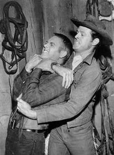 Robert Culp gets a grip on Steve McQueen on “Trackdown: The Brothers”.