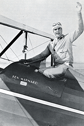 Ken Maynard in the cockpit of the airplane he owned in the early ‘30s and in which he made frequent trips to Central America. 