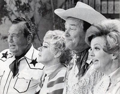 Phil Harris and wife Alice Faye with Roy Rogers and wife Dale Evans on the
“Kraft Music Hall” on February 14, 1968. 

