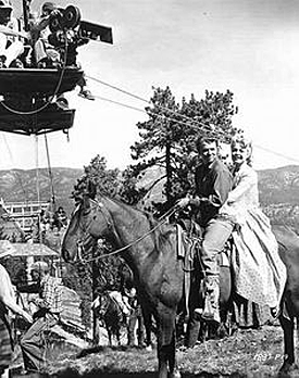 Audie Murphy and Sandra Dee prepare for a shot while filming “The Wild and the Innocent” (‘59 Universal).