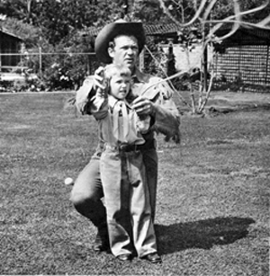 A little backyard fun! Bill (“Kit Carson”) Williams and daughter Jody.