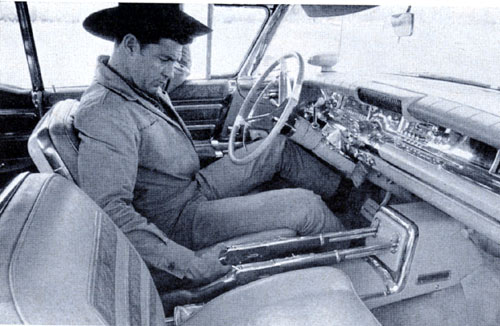“Tales of Wells Fargo” star Dale Robertson in the 1959 car given to him by his show’s sponsor who equipped it with rifles, cowhide floor and pistols in the door.