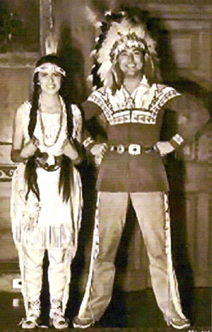 Mr. and Mrs. Johnny Mack Brown dressed as Indians won a costume party at Marion Davies’ home.