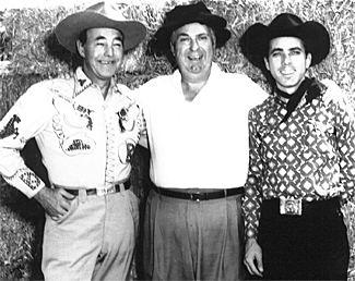 Kenne Duncan, Smiley Burnette and a young Dale Berry proforming at the Indiana State Fair in 1957. 