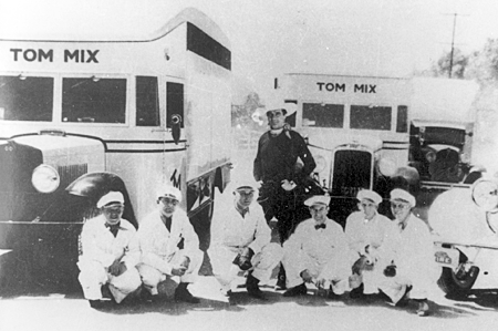Tom Mix and six of his circus truck drivers. 