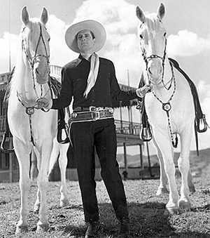 Charles Starrett in the late ‘30s at the Columbia ranch. The tack on the two white horses is similar but not identical. Anyone care to speculate on the background or reason for this photo? 