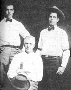 A young Hoot Gibson (right) with his father Hiram Gibson (seated) and
brother Leon Gibson on the left.