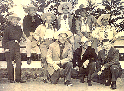 Not sure who seven of these cowpokes are, but you can certainly spot
Tom Mix and Buck Jones. 