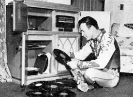 Of an evening, Roy Rogers sits by his record player to listen to some 
of his favorite songs. 
