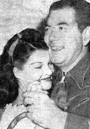 Monogram B-western star Johnny Mack Brown shares a dance with June Horne, Mrs. Jackie Cooper, in November ‘45.