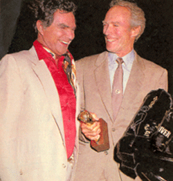 At the 1993 Golden Boot Awards which honored Clint Eastwood, Burt Reynolds honors him with a pair of custom made cowboy boots. 
