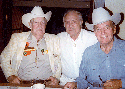 Producer/director Oliver Drake, B-Western badman Terry Frost and B-Western star Fred Scott at a Western Film Festival.