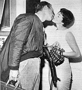 Off for another "Wanted Dead or Alive" day, Steve McQueen kisses wife Neile Adams. 