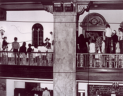 Lash LaRue exhibits his prowess with a bullwhip at an early Memphis Film Festival. Probably second floor of the Peabody Hotel.