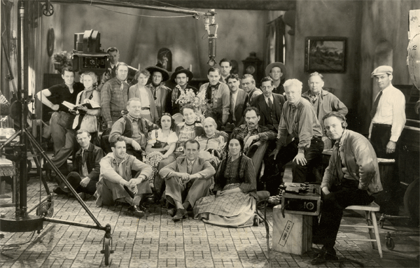 Cast and crew of "Cyclone Ranger" ('35 Spectrum).
(First Row seated L-R) Budd Buster, scriptwriter Oliver Drake, producer Ray Kirkwood, Zara Tazil (Martha, the housekeeper). 
(Second Row seated L-R) Eddie Gribbon (Duke), Nena Quartaro (Nita), Bill Cody (Pecos Kid), Soledad Jimenez (Dona Castalar), Earle Hodgins (Pancho Gonzales).
(Third Row standing L-R) Unknown, script supervisor, Ace Cain, unknown, unknown, Barney Beasley (in black), Donald Reed, unknown, unknown, unkown, unknown, unkown, unkown, unknown. Sound man is sitting. Diretor Bob Hill is standing.
