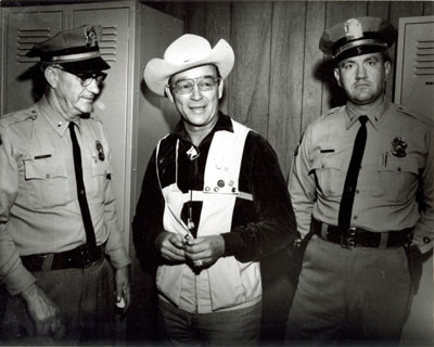 Roy Rogers poses in 1966 with Lt. Ralph Staples (left) and Lt. Lee Tye (right) of the Johnson County, Kansas, Sheriff’s Department.