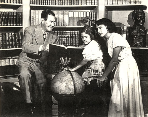 Johnny Mack Brown at home with daughters Cynthia and Janey. Circa mid-‘40s.