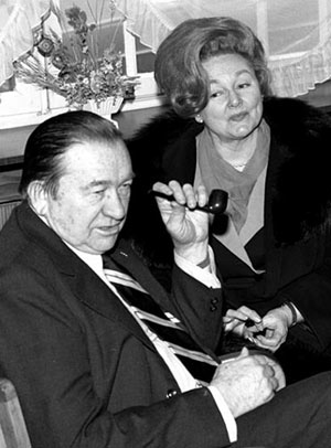 Tex Ritter and wife Dorothy Fay talk to a reporter in Wiesbaden, Germany, on January 21, 1971, at the beginning of their tour of U.S. military bases in Europe.