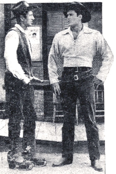 6 ft. 6" Clint (“Cheyenne”) Walker with his stand-in, 6 ft. 3" Clyde Howdy. Note Howdy’s fitted step-in sandals with 3" thick soles strapped to his boots to give him a lift. (Thanx to Terry Cutts.)