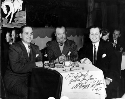 A very debonair looking Al “Fuzzy” St. John dines in 1951 with producer-brothers Richard and Alex Gordon. (Thanx to Tom Weaver.)