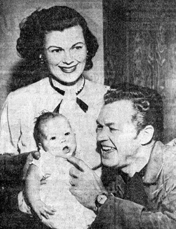 TV’s Kit Carson, Bill Williams, and wife Barbara Hale with their new daughter Laura Lee in April, 1954.