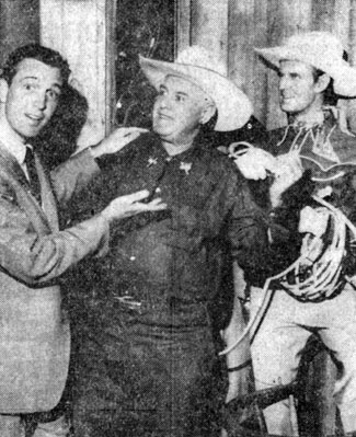 Jack Linkletter interviews Ken Maynard in front of a wax figure of Ken for Linkletter's "Here's Hollywood" Philadelphia, PA, TV show on July 26, 1962.