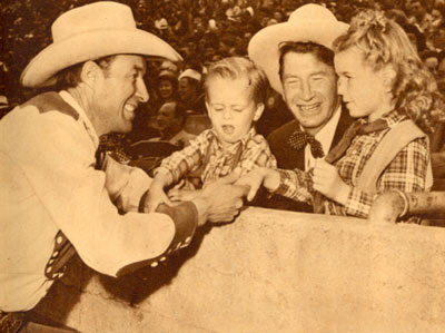 Chill Wills introduces his kids to Wild Bill Elliott at the July 1945 Roy Rogers Rodeo in Hollywood.