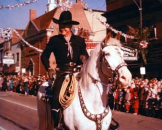 Hopalong Cassidy rides in a 1957 Christmas Parade in High Point, NC. (Thanx to Jerry Whittington.)