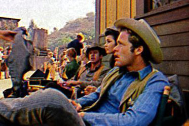 Clu Gulager, Diane Roter and Doug McClure await a call for a scene on “The Virginian”. (Thanx to Diane Roter.)