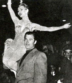 Clint “Cheyenne” Walker easily lifts a skating starlet at a late ‘50s Icecapade show. (Thanx to Terry Cutts.)
