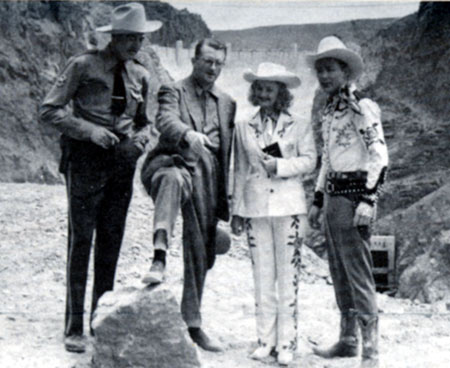 At Boulder Dam, director Frank McDonald (second from left) explains the next scene in Republic’s “Heldorado” (‘46) to LeRoy Mason, Dale Evans and Roy Rogers.