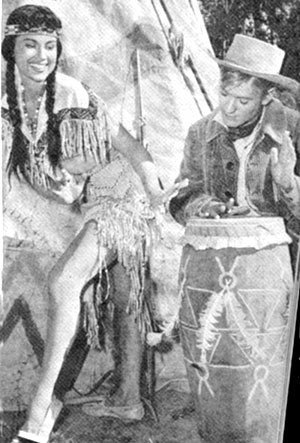 Will “Sugarfoot” Hutchins beats a few hot licks on a war drum while Lisa Montell chants from “The Indian Love Song”.