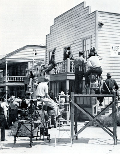 Stuntman Yakima Canutt takes a two story back dive into an off camera fireman’s net in a Republic Three Mesquiteers B-western. That’s Ray “Crash” Corrigan on the balcony.