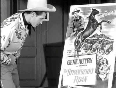 In “Hoedown” (‘50 Columbia) Jocko Mahoney plays brokendown, naive ex-cowboy star Stoney Rhodes. This cute scene in the movie comes when Jocko talks to a Gene Autry one-sheet in front of a theater. (Thanx to Jimmy Glover.)