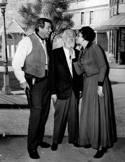 Howard Keel and Jane Russell were filming “Waco” in ‘66 for A. C. Lyles on the backlot of Paramount when Gabby Hayes stopped by for a kiss from Jane. (Thanx to Bobby Copeland.)